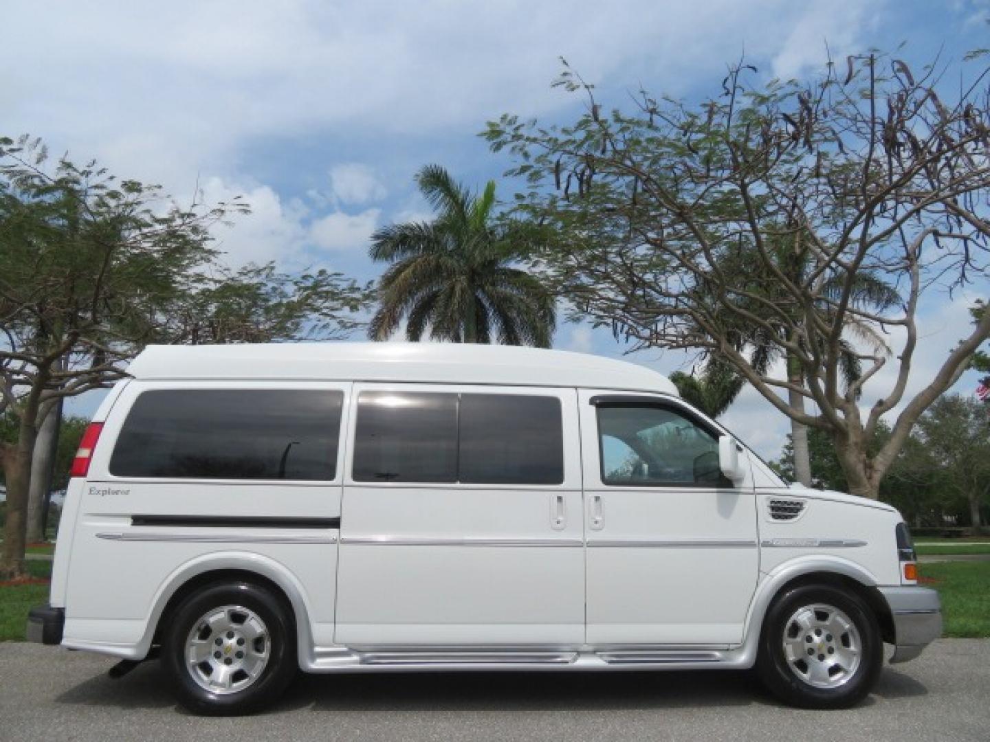 2010 White /Gray Chevrolet Express (1GNUGCD48A1) , located at 4301 Oak Circle #19, Boca Raton, FL, 33431, (954) 561-2499, 26.388861, -80.084038 - You are looking at a Gorgeous 2010 Chevy Express Handicap Wheelchair Conversion Van Explorer Limited SE with 31K Original Miles, Braun Century 750lb Side Entry Wheelchair lift, Tie Down System in the Floor, Rear Entertainment with Flat Screen TV/DVD, Leather Interior, Rear Power Folding Bench Seat/b - Photo#3